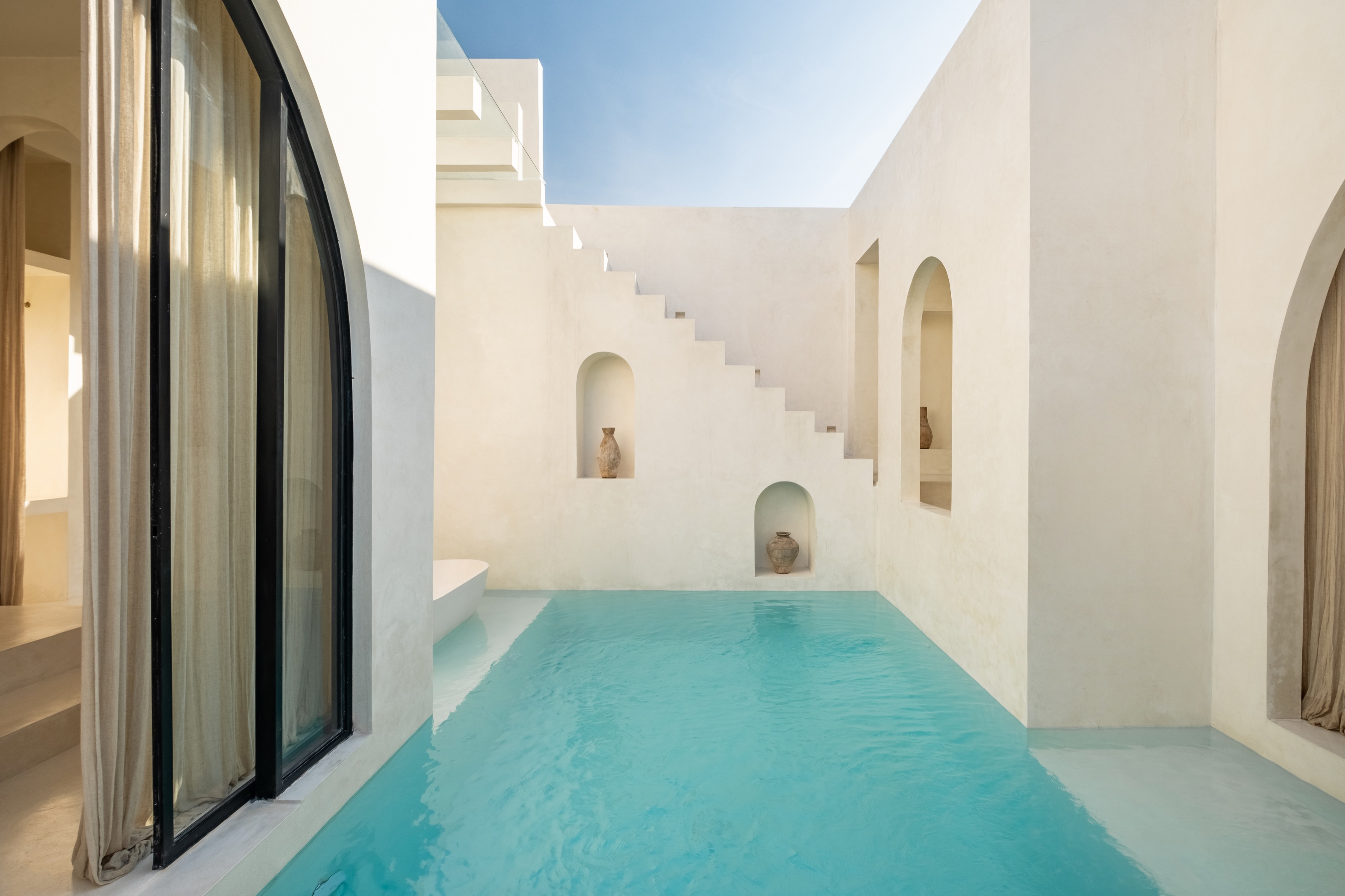 Water corridor between the villa walls