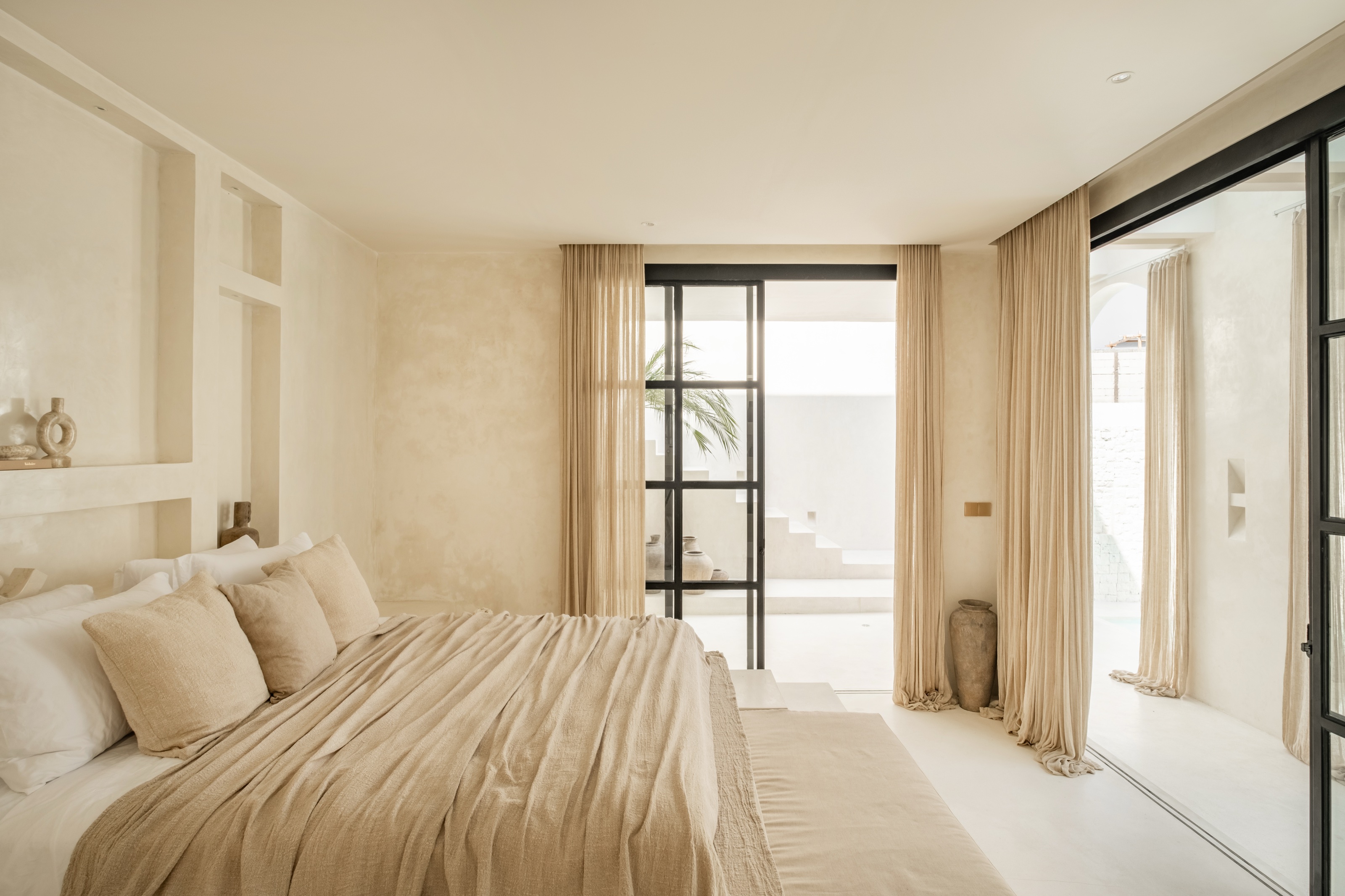 Light-filled bedroom at Villa 02
